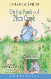 On the Banks of Plum Creek (Little House the Laura Years) by Laura Ingalls Wilder Paperback Book