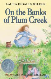 On the Banks of Plum Creek by Laura Ingalls Wilder Paperback Book