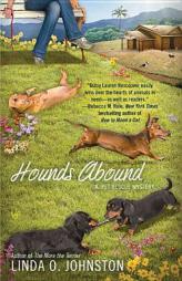Hounds Abound (A Pet Rescue Mystery) by Linda O. Johnston Paperback Book