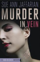 Murder in Vein (A Fang-in-Cheek Mystery) by Sue Ann Jaffarian Paperback Book