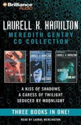 A Kiss of Shadows / A Caress of Twilight / Seduced by Moonlight (Meredith Gentry) (Meredith Gentry) by Laurell K. Hamilton Paperback Book