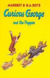 Curious George and the Puppies by Margret Rey Paperback Book