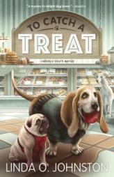 To Catch a Treat (A Barkery & Biscuits Mystery) by Linda O. Johnston Paperback Book