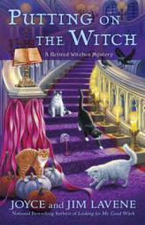 Putting on the Witch: A Retired Witches Spellbook Mystery by Joyce Lavene Paperback Book