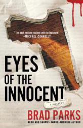 Eyes of the Innocent: A Mystery by Brad Parks Paperback Book