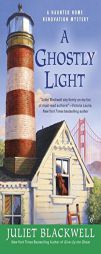 A Ghostly Light by Juliet Blackwell Paperback Book