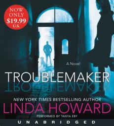 Troublemaker Low Price CD: A Novel by Linda Howard Paperback Book