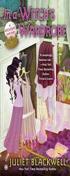 In a Witch's Wardrobe: A Witchcraft Mystery by Juliet Blackwell Paperback Book