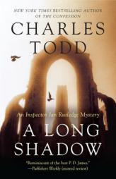 A Long Shadow: An Inspector Ian Rutledge Mystery (Inspector Ian Rutledge Mysteries) by Charles Todd Paperback Book