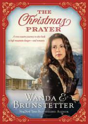 The Christmas Prayer: A Cross-Country Journey in 1850 Leads to High Mountain Danger--And Romance. by Wanda E. Brunstetter Paperback Book