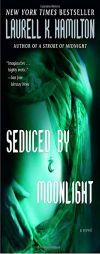 Seduced by Moonlight (Meredith Gentry Novel) by Laurell K. Hamilton Paperback Book