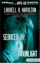 Seduced by Moonlight (Meredith Gentry) by Laurell K. Hamilton Paperback Book