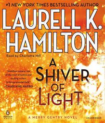 A Shiver of Light (A Merry Gentry Novel) by Laurell K. Hamilton Paperback Book