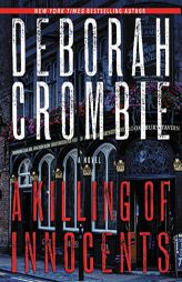 A Killing of Innocents: A Novel (Duncan Kincaid / Gemma James Novels, Book 19) by Deborah Crombie Paperback Book
